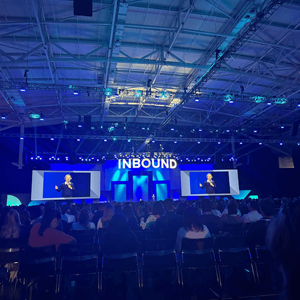 Inbound event: man on stage talking.